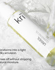 Image of a bottle of Unveil Cleansing Oil, which  transforms into a light milky emulsion. Rinses off without stripping natural moisture.